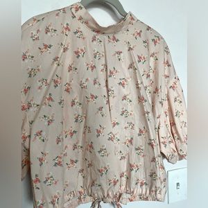 Peach floral top by Anthropologie